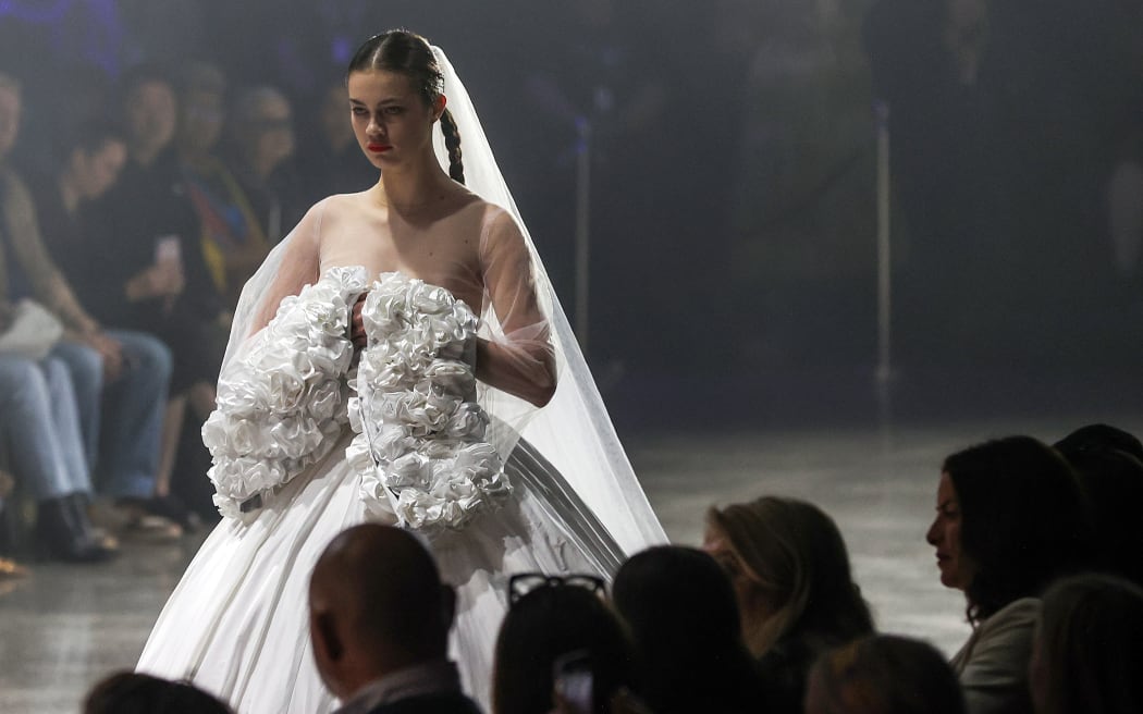 AUCKLAND, NEW ZEALAND - AUGUST 30: A model walks the runway by designer Ivantino House from Otago University during The Graduate Show during New Zealand Fashion Week 23: Kahuria at Viaduct Events Centre‎ on August 30, 2023 in Auckland, New Zealand.