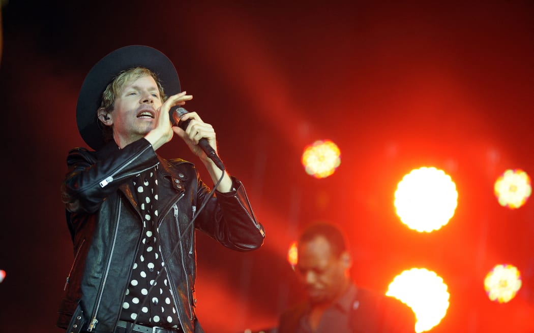 US artist Beck (Beck Hansen) performs on the Pyramid stage on day five of the Glastonbury Festival of Music and Performing Arts on Worthy Farm near the village of Pilton in Somerset, South West England on June 26, 2016. (Photo by Andy Buchanan / AFP)