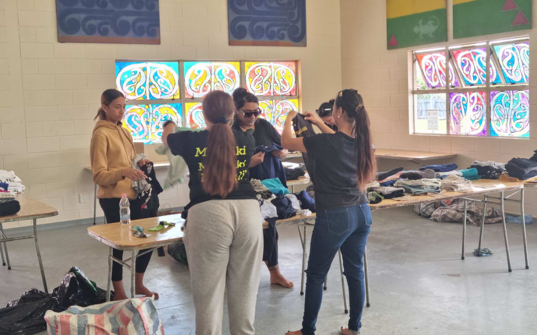 Locals help out at the Omahu marae.