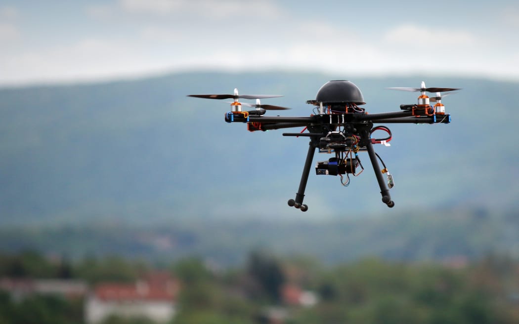 flying drone with camera on the sky