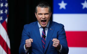 US Secretary of Defense Pete Hegseth addresses senior military officers at Marine Corps Base Quantico in Quantico, Virginia, on September 30, 2025. Pentagon chief Pete Hegseth on Tuesday told a rare gathering of top brass called back from bases around the world that the US military will be reformed to end what he called "decades of decay." Speaking to hundreds of generals and admirals in Quantico, Virginia, Hegseth declared an end to "ideological garbage," giving concerns over climate change, bullying, "toxic" leaders, and promotions based on race or gender as examples. (Photo by Andrew Harnik / POOL / AFP)