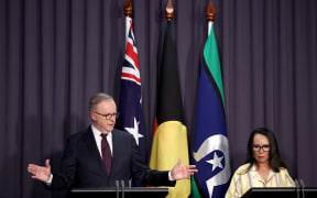 Australia's Prime Minister Anthony Albanese (L) and Minister for Indigenous Australians Linda Burney attend a media conference at Parliament House in Canberra on October 14, 2023.