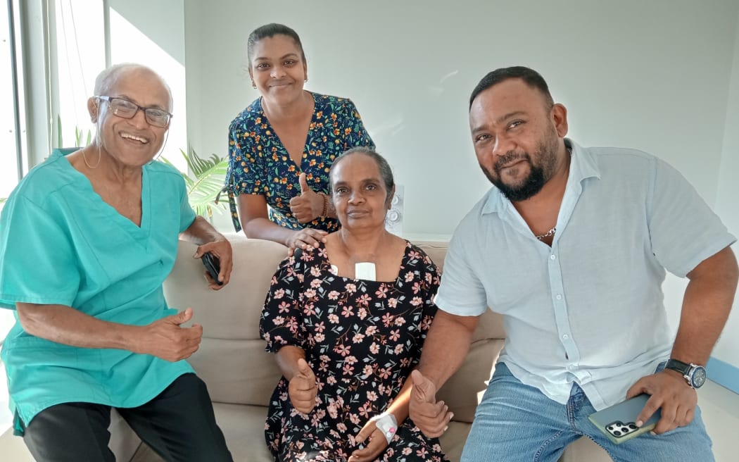 An elated Kusum Lata with PSH founder and CEO Parvish Kumar, second from right, and his medical team.