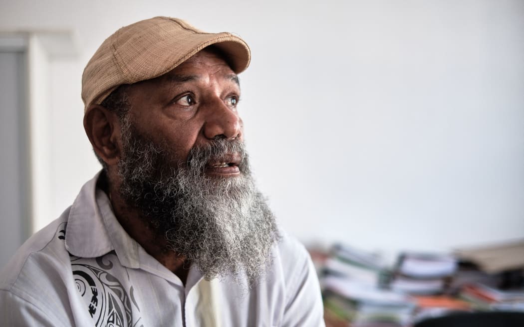 Charles Washetine, spokesperson and elected representative of the Palika Kanak Liberation Party, poses in his office in Noumea.