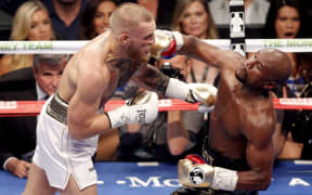 Conor McGregor fighting Floyd Mayweather Jr.