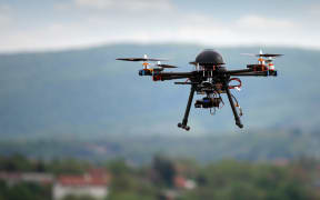 flying drone with camera on the sky