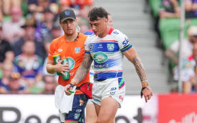 Charnze Nicoll-Klokstad of the Warriors leaves the field injured during the Telstra NRL Premiership match between the NZ Warriors and the Melbourne Storm.