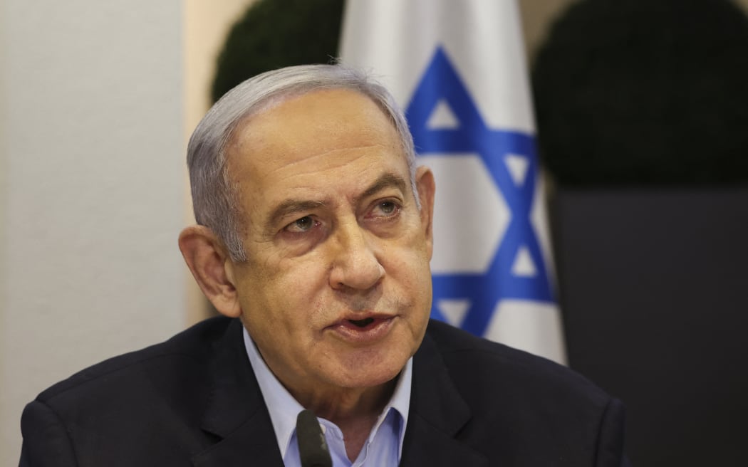 Israeli Prime Minister Benjamin Netanyahu heads the weekly cabinet meeting at the Defence Ministry in Tel Aviv on January 7, 2024. (Photo by RONEN ZVULUN / POOL / AFP)