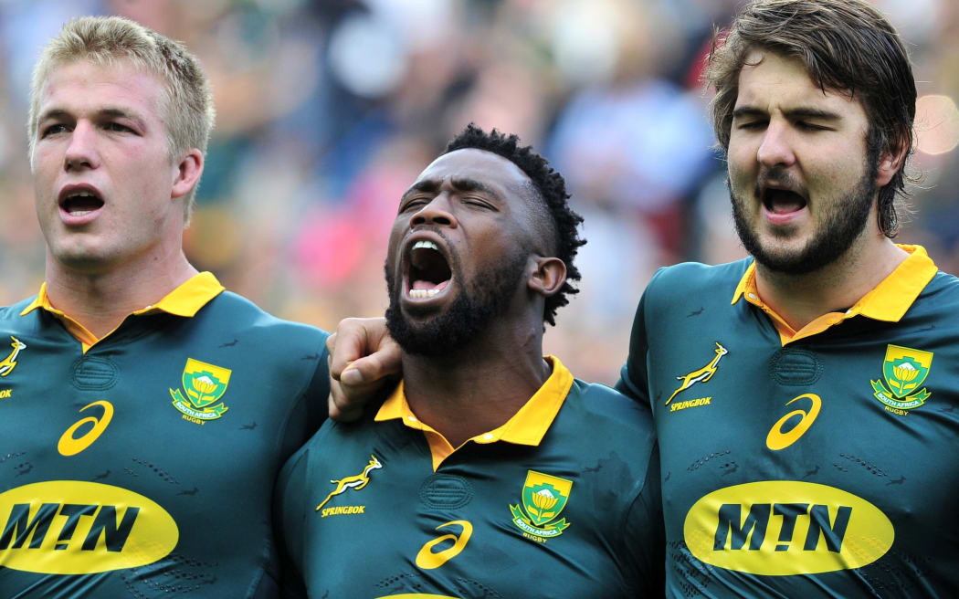 Pieter-Steph du Toit, Siya Kolisi and Lood de Jager of South Africa sing the national anthem before the Rugby Championship game between South Africa and New Zealand at Newlands, 2017.