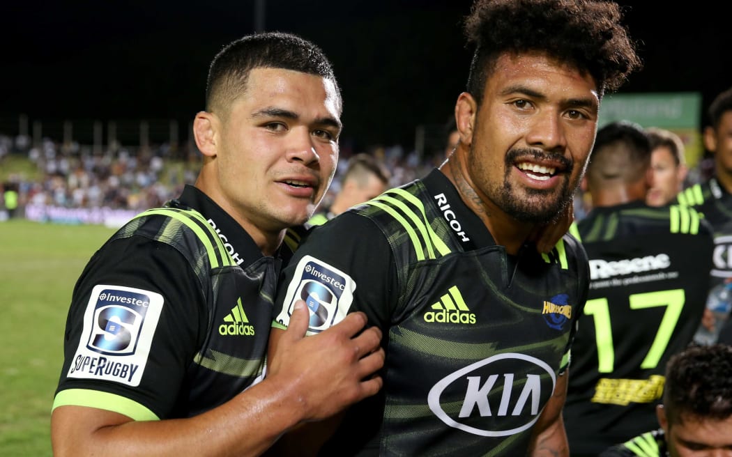 Du'Plessi Kirifi with Hurricanes teammate Ardie Savea.
