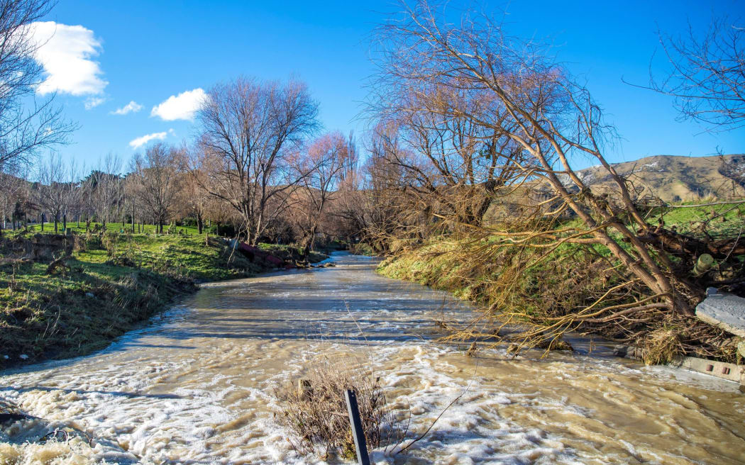 Debris washed up at the back of retired Ward farmer John Elliot’s property after heavy rain in July.