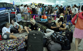 Passengers at Ngurah Rai International airport in Denpasar.