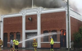 Firefighters fighting a blaze at the Roxburgh Town Hall on 6 February, 2024.