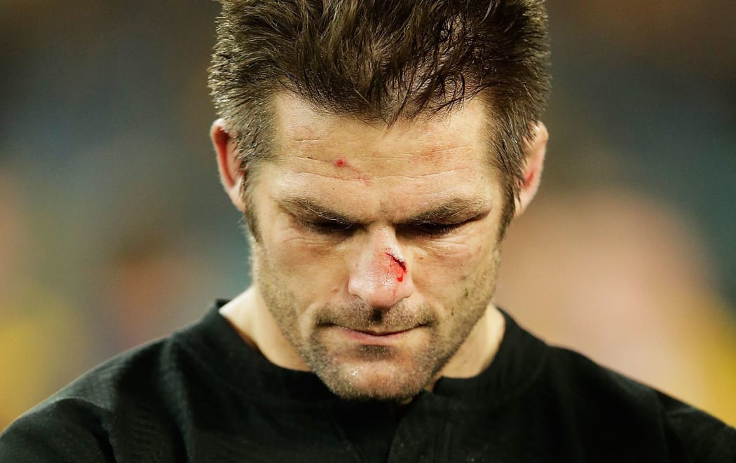 The All Blacks captain Richie McCaw  looks dejected after New Zealand's loss to the Wallabies.