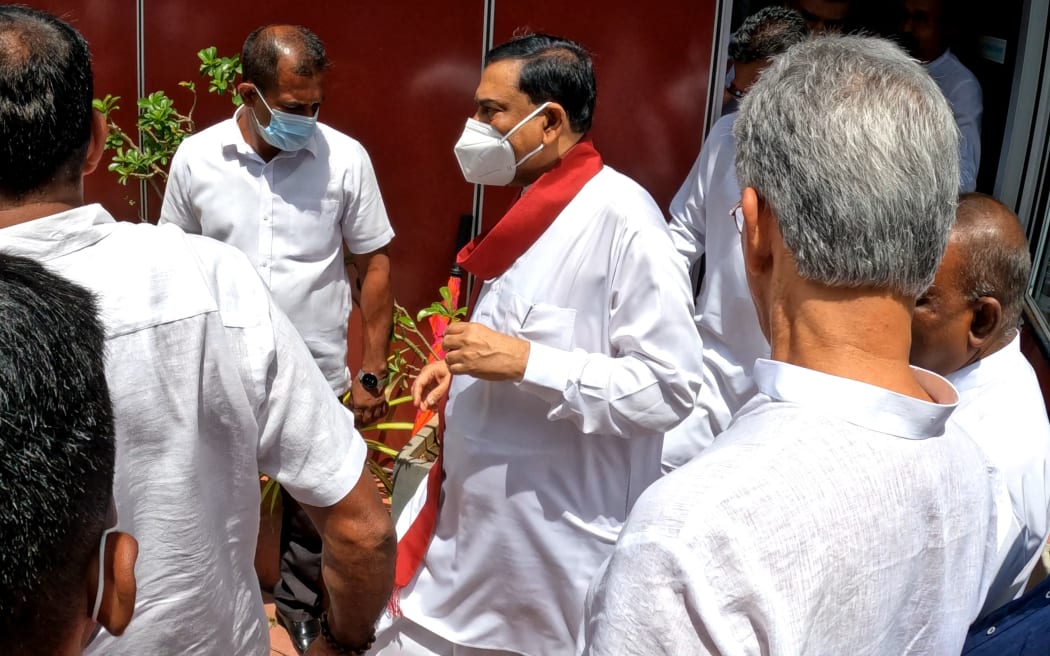 Sri Lanka's former finance minister Basil Rajapaksa gestures after attending his final press conference to inform his resignation as a Member of parliament at Colombo, Sri Lanka.