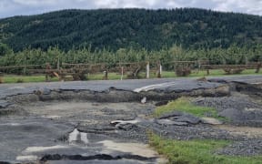 A damaged road in Eskdale, north of Napier.