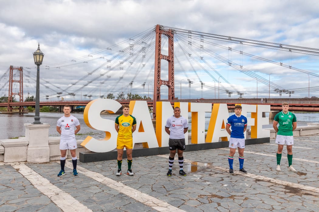 Fiji's Tevita Ikanivere takes centre stage alongside the captains from England, Australia, Italy and Ireland, in front of the Puente Colgante (Hanging Bridge) on Santa Fe’s promenade.