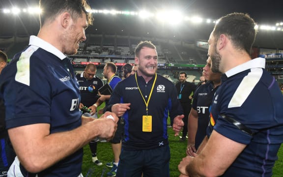 Injured Scotland full back Stuart Hogg celebrates victory over Australia with Tim Swinson and Alex Dunbar.