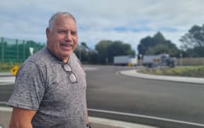 Waitara community board member stands near a roundabout on SH3 between Waitara and Bell Block.