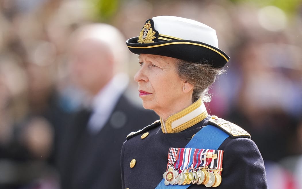 Britain's Princess Anne, Princess Royal, follows the coffin of Queen Elizabeth II, adorned with a Royal Standard and the Imperial State Crown and pulled by a Gun Carriage of The King's Troop Royal Horse Artillery, during a procession from Buckingham Palace to the Palace of Westminster, in London on September 14, 2022. - Queen Elizabeth II will lie in state in Westminster Hall inside the Palace of Westminster, from Wednesday until a few hours before her funeral on Monday, with huge queues expected to file past her coffin to pay their respects. (Photo by Martin Meissner / POOL / AFP)