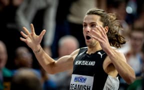 New Zealand’s Geordie Beamish celebrates winning gold in the 1500m at the World Indoor Athletics Championships, 2024, Glasgow