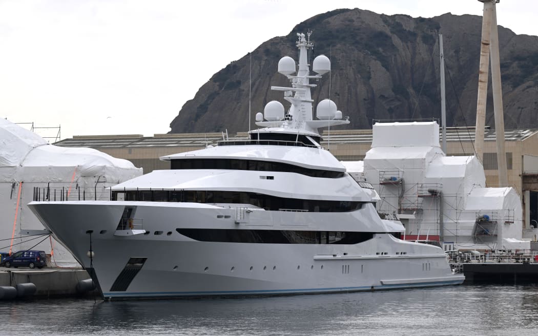 A picture taken on March 3, 2022 in a shipyard of La Ciotat, near Marseille, southern France, shows Amore Vero, which French authorities say is owned by a company linked to Igor Sechin, chief executive of Russian energy giant Rosneft.