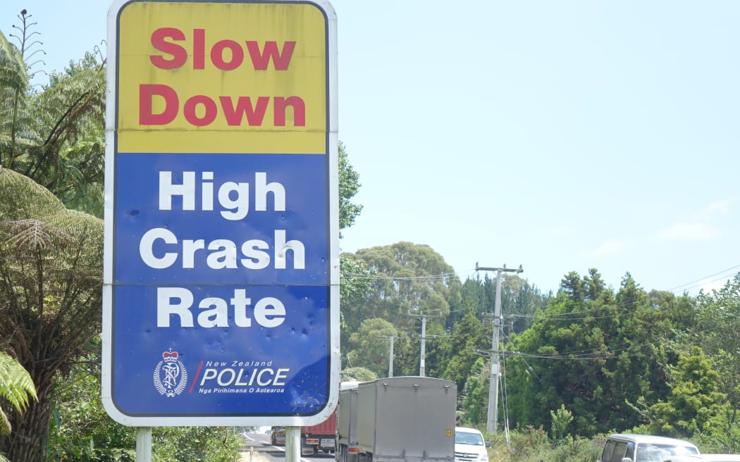 A sign on SH2 warning motorists to slow down.