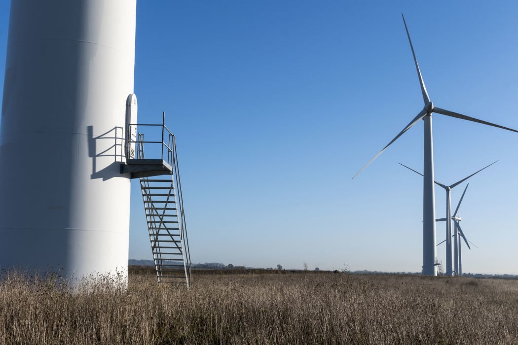 Wind turbines. (Photo by FreelanceImages/Universal Images / UIG / Science Photo Library via AFP)