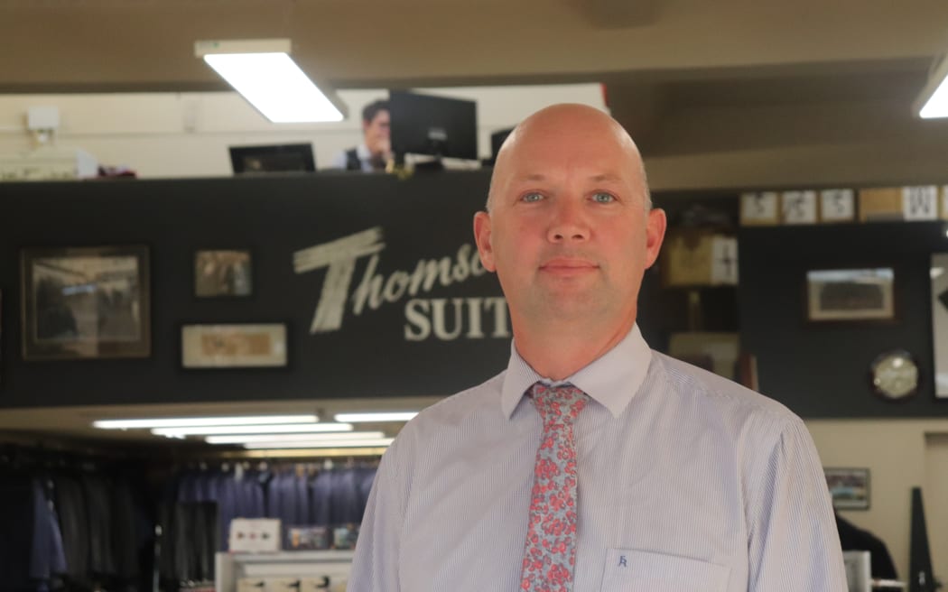 Thomson's Suits managing director Angus Thomson says introducing inner city living and doing up derelict buildings could improve the west side of Hastings.