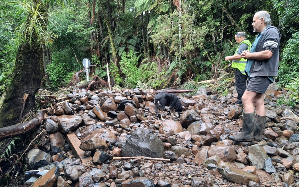 The Wekaweka Road bridge is buried somewhere under those rocks. A guard rail can be seen on the left.