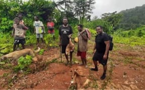 Pastor Israel Sibia and boys in the community up in the hills of central Guadalcanal, Solomon Islands.