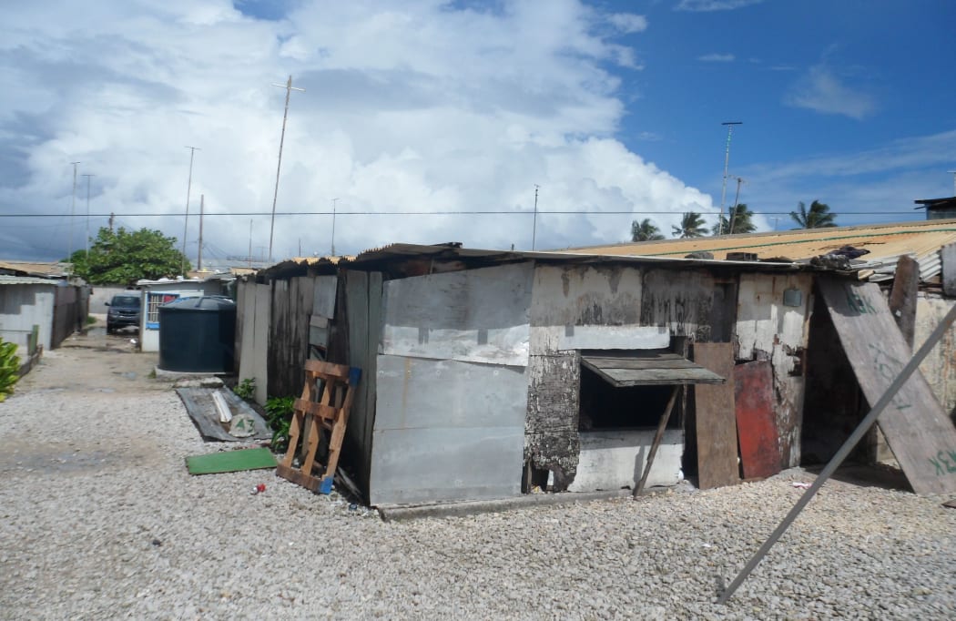Overcrowded and dilapidated housing conditions are the norm for islanders from Kwajalein's "mid-corridor" who were evacuated 50 years ago to make way for missile testing. Marshall Islands.