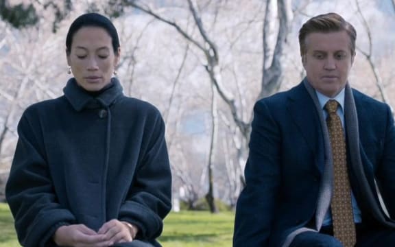 A still image from Netflix series Secret City, starring Eugenia Yuan and Dan Wyllie