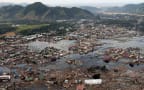 This US Navy handout photo taken 02 January 2005 shows a village along the coast of Sumatra in ruins after an earthquake and tsunami stuck off the coast 26 December.