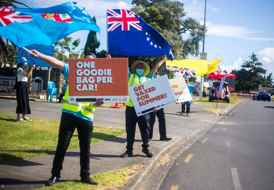Fiji, Cook Islands, Niue and Tongan flags waved to passersby