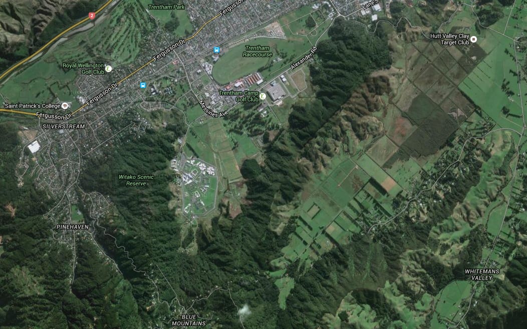 A large scrub fire is burning off Katherine Mansfield Drive, which is located in the bottom left corner near Whitemans Valley.