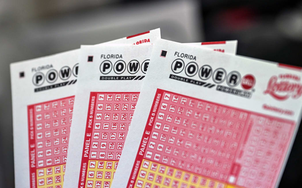 Powerball lottery tickets pictured inside a store in Homestead, Florida on July 19, 2023. The Powerball jackpot has reached 1 billion USD for the July 19, 2023, drawing, which has only happened two times before in the history of the game. (Photo by GIORGIO VIERA / AFP)