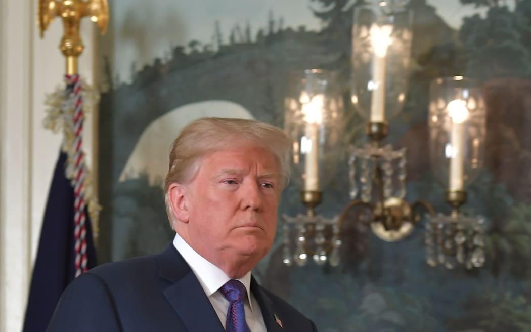 US President Donald Trump arrives to address the nation on the situation in Syria April 13, 2018 at the White House in Washington, DC.