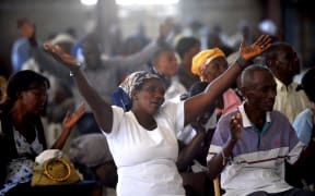 Haitians at Mass in Port-au-Prince on the fourth anniversary of the earthquake.