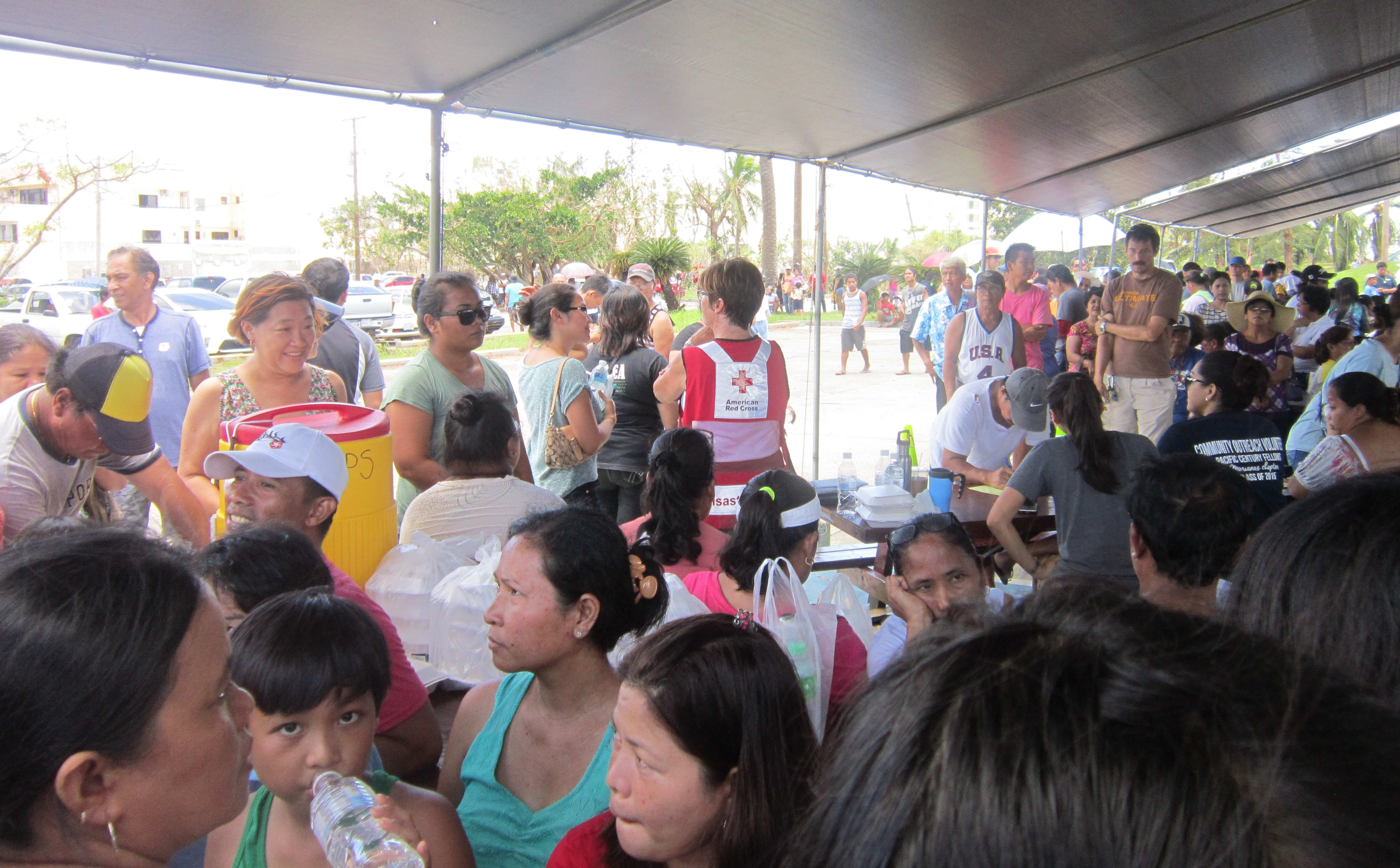 Saipan residents queue for post-typhoon aid at the American Memorial Park, Northern Marianas.