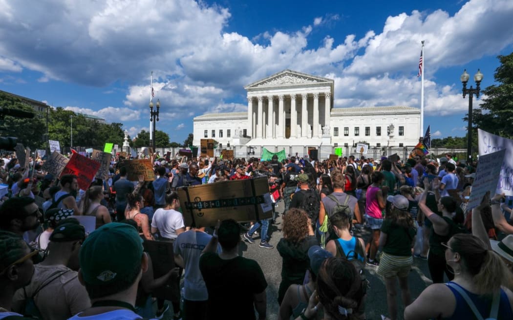 Protesters gather outside the US Supreme Court in Washington DC, following the reversal of Roe vs Wade.