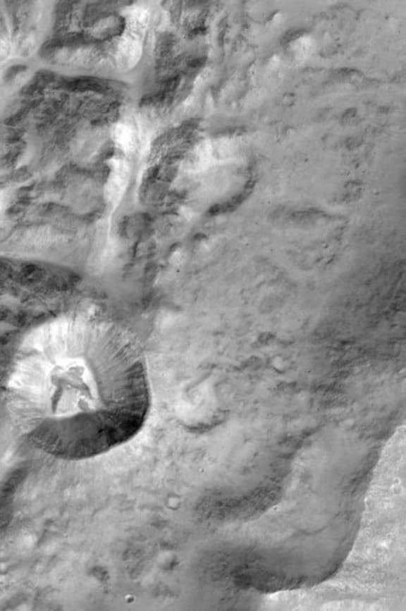 A picture released by the European Space Agency shows close-up of the rim of a large unnamed crater north of a crater named Da Vinci, situated near the Mars equator.