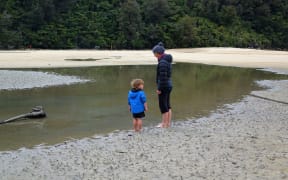 A mum and toddler in the Abel Tasman National Park where it's expected more Kiwis will get the chance to see.