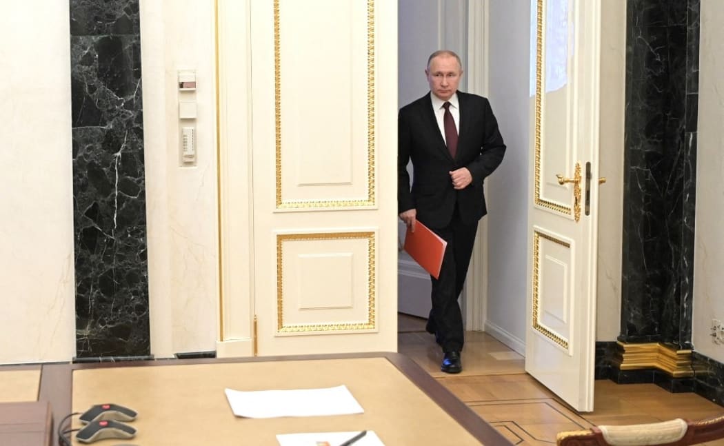 Russia President Vladimir Putin meets with permanent members of the Security Council on the Ukraine situation at Kremlin, Moscow, on Friday Feb 25, 2022.