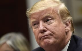 President Donald Trump listens during a meeting with Hispanic pastors in the Roosevelt Room of the White House in Washington, Friday, Jan. 25, 2019. (AP Photo/Susan Walsh)