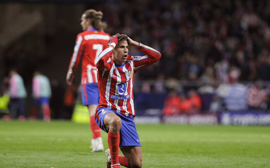 Giuliano Simeone of Atletico de Madrid reacts to a missed opportunity.