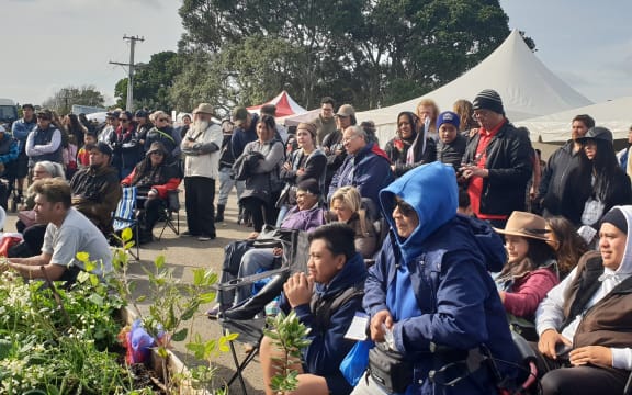 People gathering to hear the karakia and waiata from the Ratana faith, and other religious groups at Ihumātao on Sunday, 28 July.