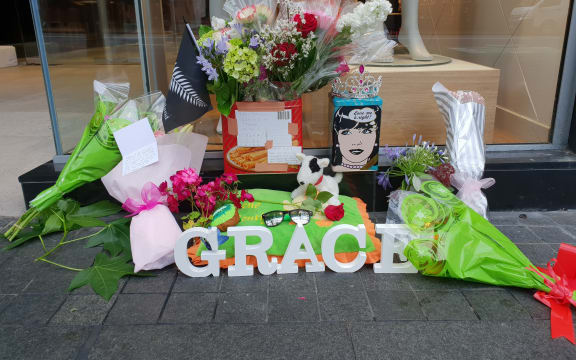 Flowers laid outside CityLife Hotel where Grace was last seen alive on 1 December.