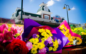 Flowers outside Dreamworld in Queensland, where four people died.