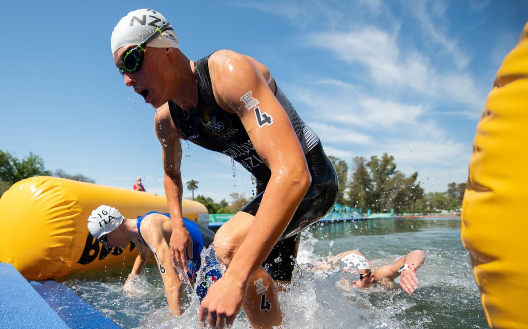 Dylan Mccullough NZL exits the swim of the men's Triathlon at 2018 Youth Olympics.